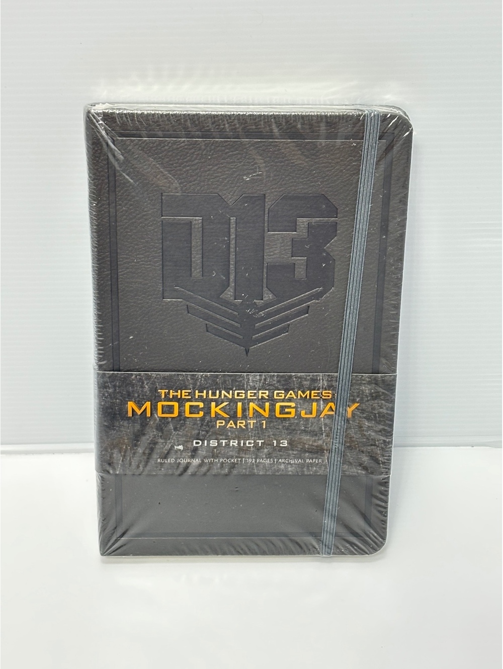 The Hunger Games Mockingjay Part 1 District 13 Ruled Journal with Pocket, 192pg